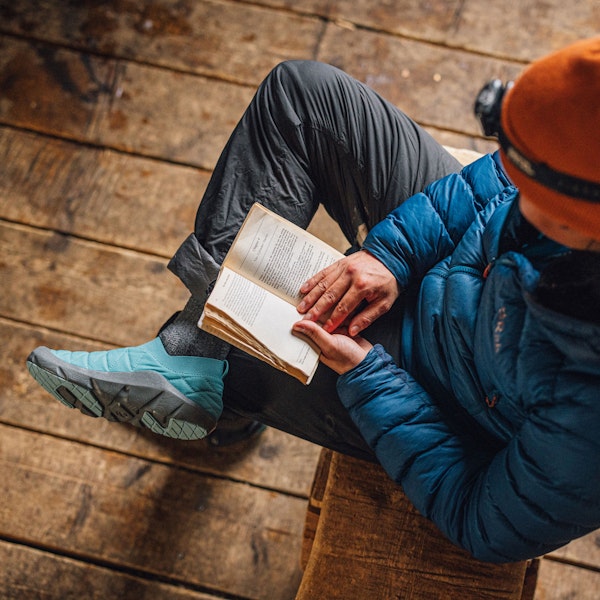 Reading a book in the Oboz Whakatā Low Print shoes.