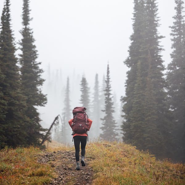 Hiker on the backcountry trail wear Oboz hiking boots.