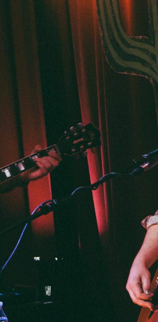 Two musicians performing at Live from the Divide in Bozeman, MT