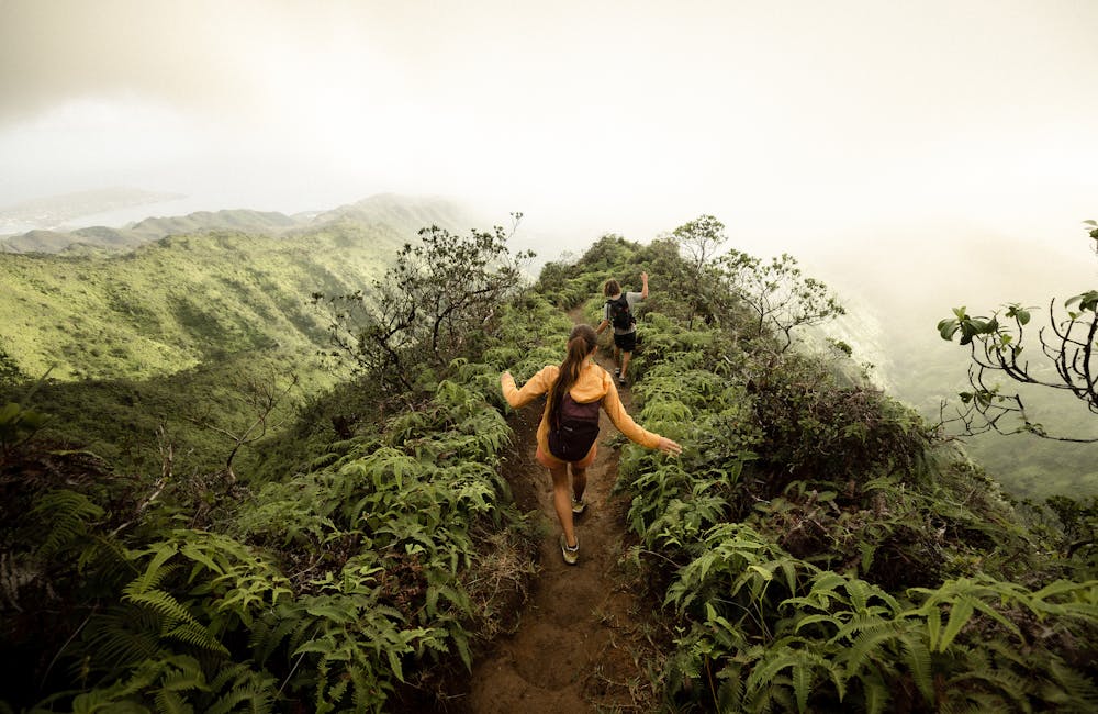 Two hikers descending a ridge in the Oboz Cottonwood Low hiking shoes.