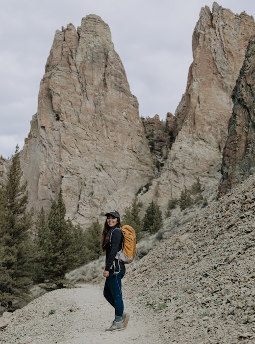 Lindsay Kagalis hiking in the Women's Bozeman Mid shoes surrounded by cool rock formations