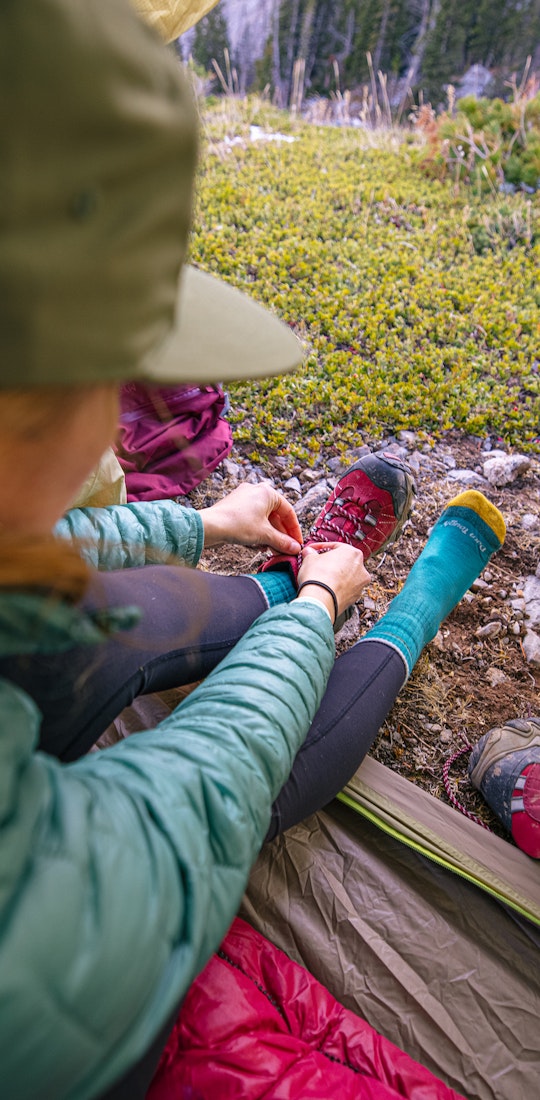 Keeping her feet warm and dry in the Rio Red Bridger Mid Waterproof while camping