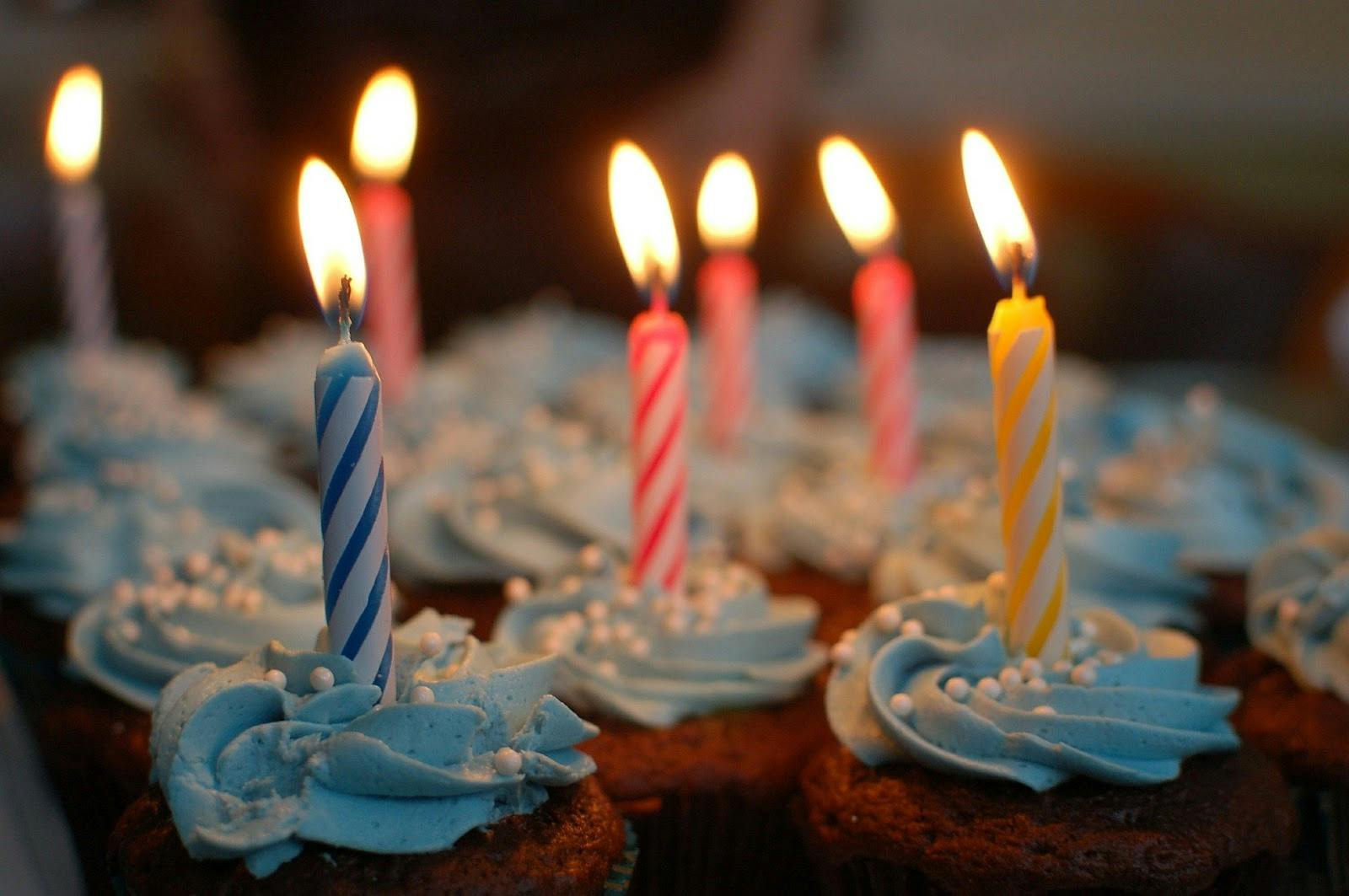 Cupcakes with burning candles