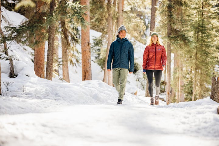 Walking in the woods wearing the Oboz Sphinx winter insulated boots.