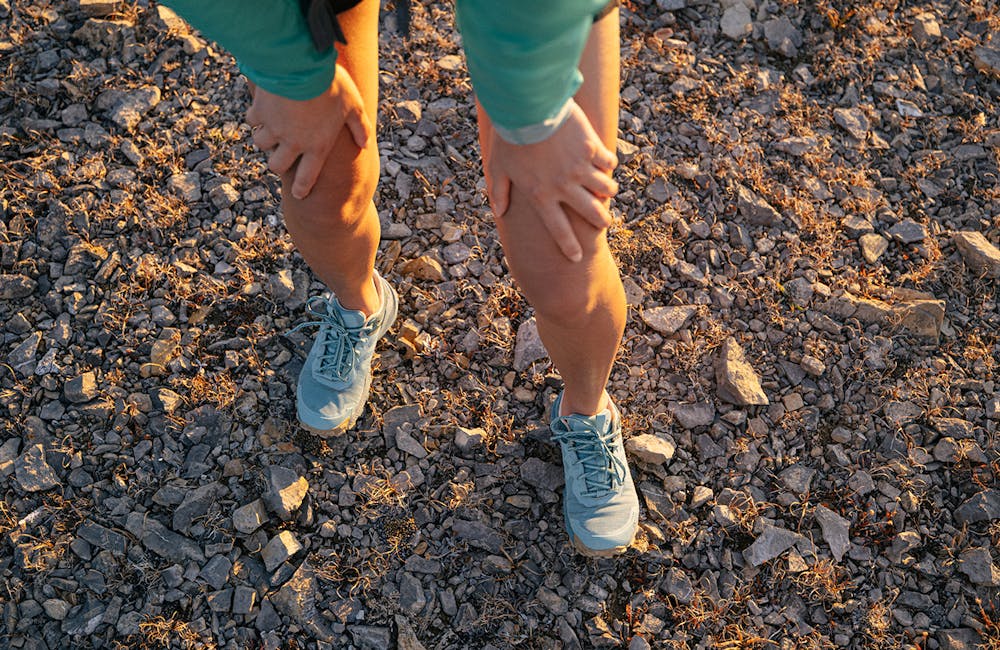 A woman out for a run in Oboz Katabatic hiking shoes