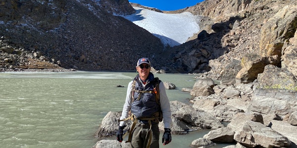 Oboz Footwear Trailblazer Jeff Randa at a glacial lake.