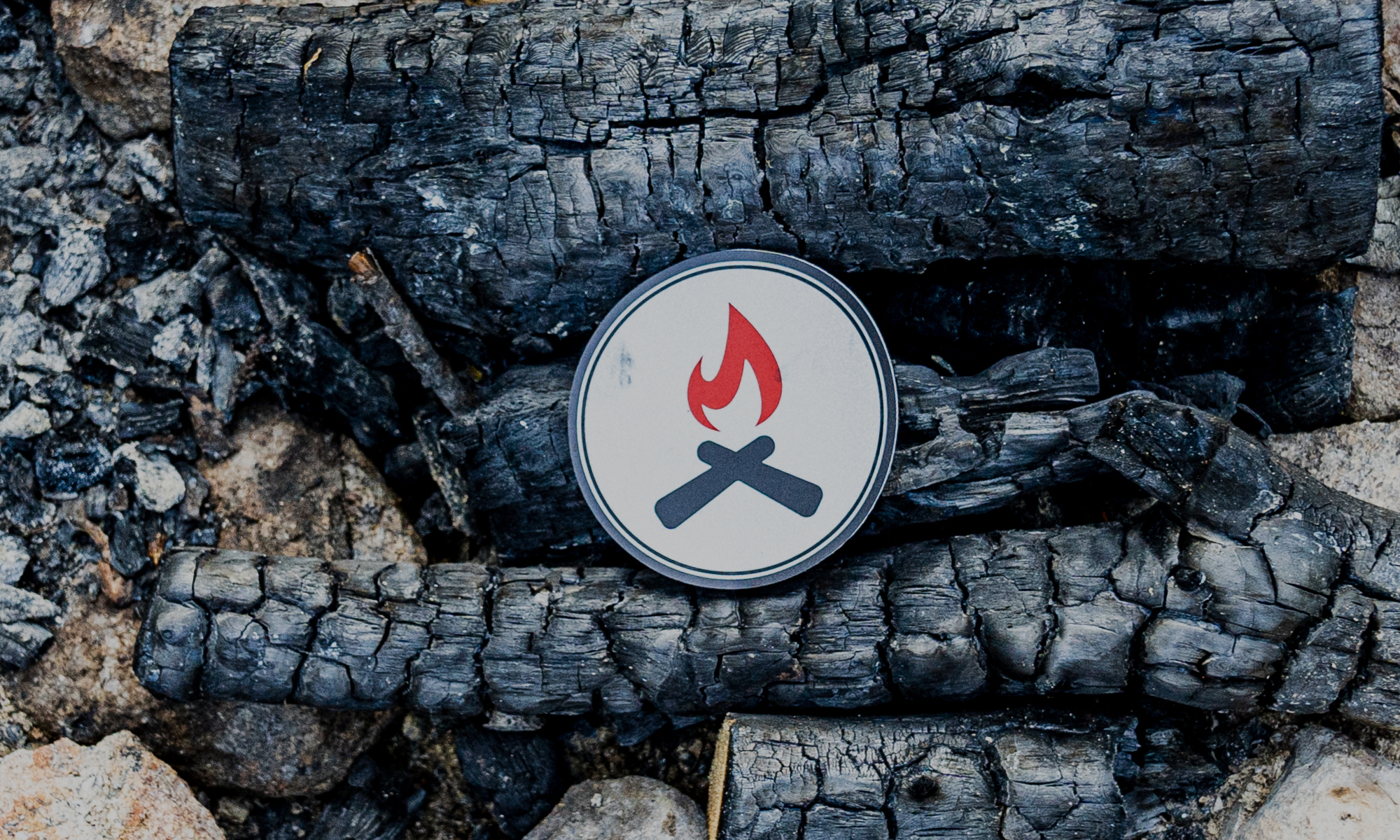 Oboz Black Folks Camp Too logo representing Unity Blaze.