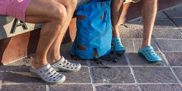 Two people wearing Oboz Whakata Coast casual sandals.
