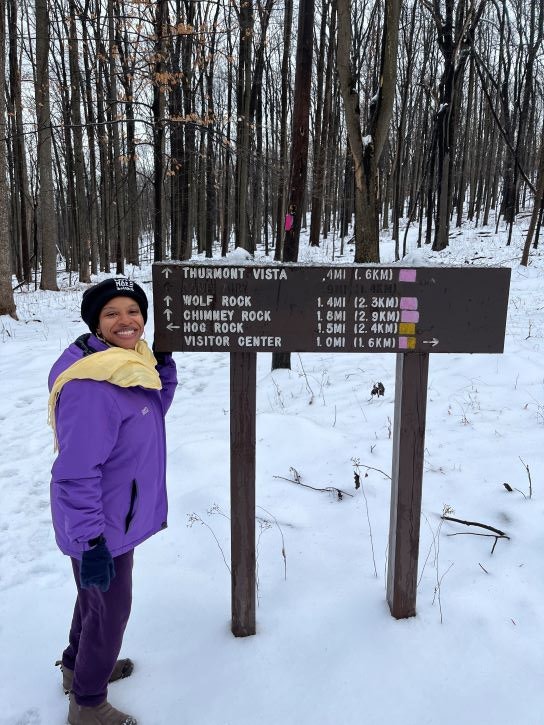 Diamon Clark on a winter hike through the snow.