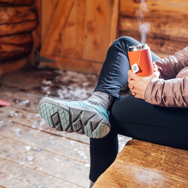 Drinking tea in the Oboz Whakatā Puffy Low slippers.