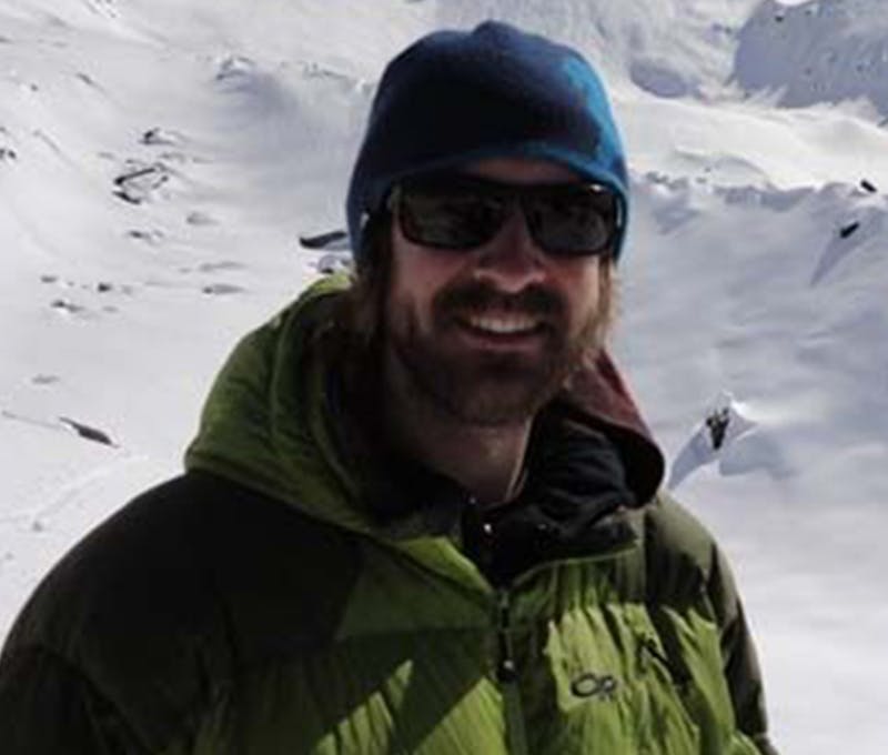 Steve Lowry exploring in the snowy mountains
