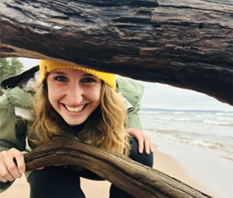 Abigail Cook smiling on the beach