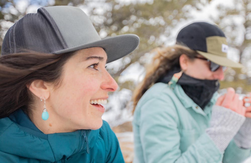 Oboz Ambassador Jackie Nourse smiling while on a hike.