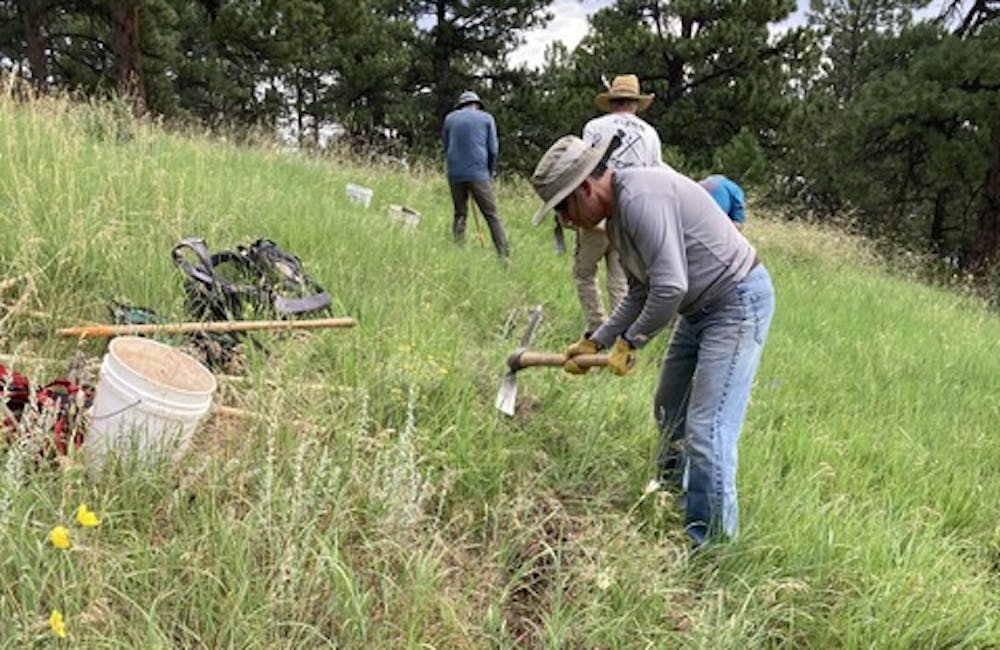 Oboz Local Hero, Dan Cavaliere, on a recent trail work day.