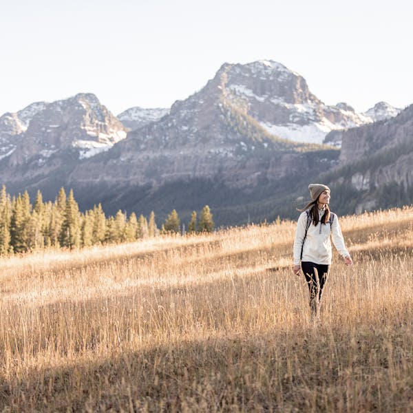 Woman on a mountain trail with the Oboz Sawtooth II Low B Dry hiking shoe.