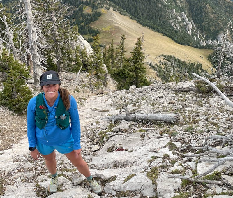 Oboz employee hiking in the mountains.