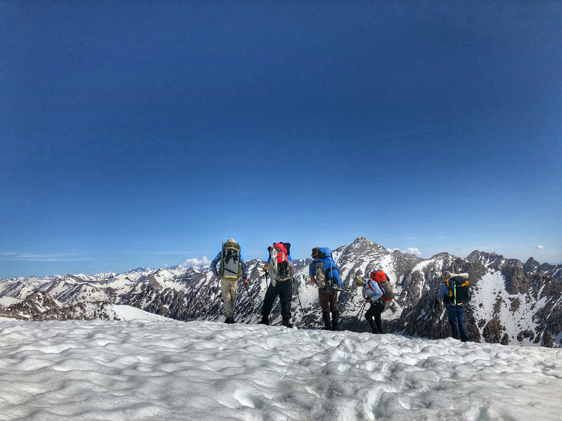 Backpacking on a snow covered trail in winter