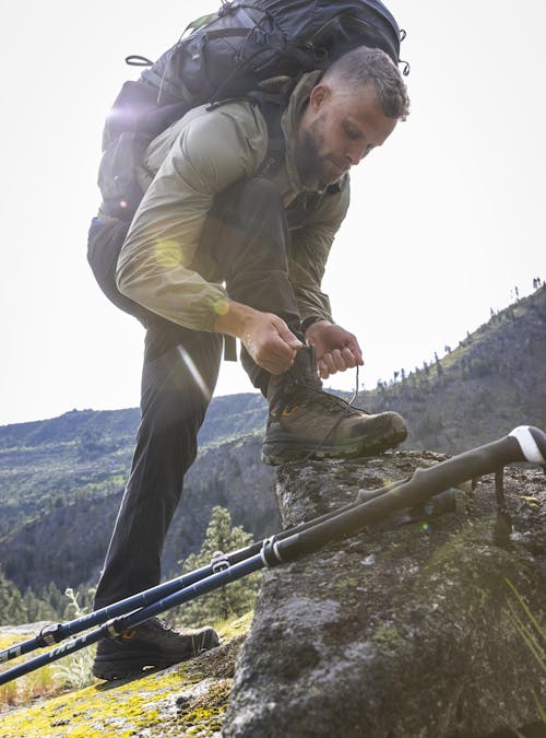 Man wearing Oboz Bridger Ridge waterproof hiking boots on the trail.