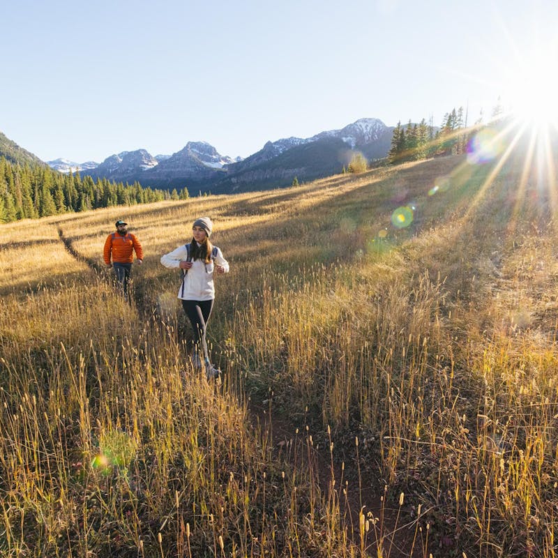 Hikers wearing Oboz Sawtooth II on a beautiful hiking trail.