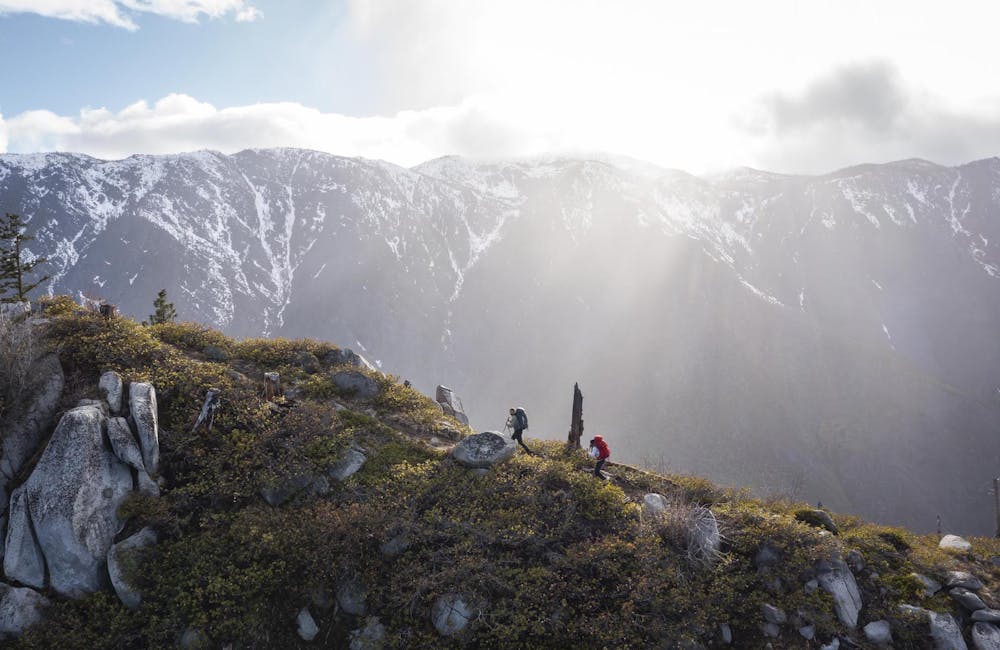 Hikers wearing Oboz Bridger Ridge on a beautiful hiking trail.