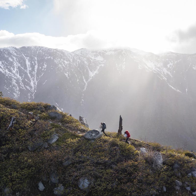 Hikers wearing Oboz Bridger Ridge on a beautiful hiking trail.