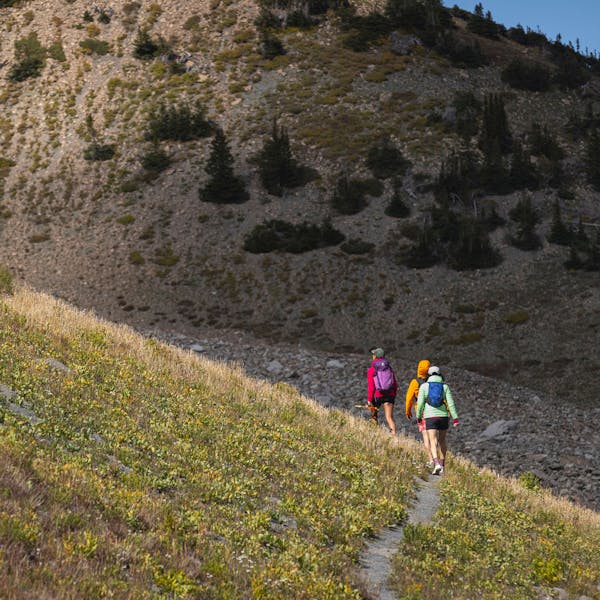Hiking a steep trail in Oboz Footwear.