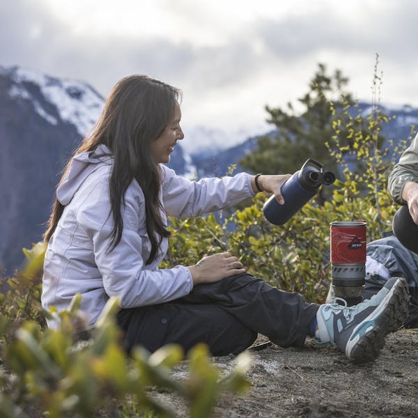 Two hikers enjoying a meal break in the Oboz Bridger Ridge hiking boots.