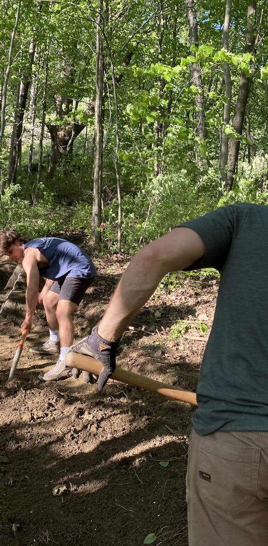 Phil and Hailey build biking and hiking trails.
