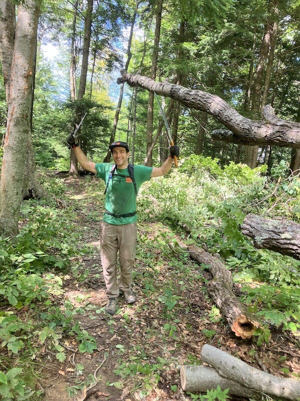 A trail worker helps to build trail systems in Vermont.