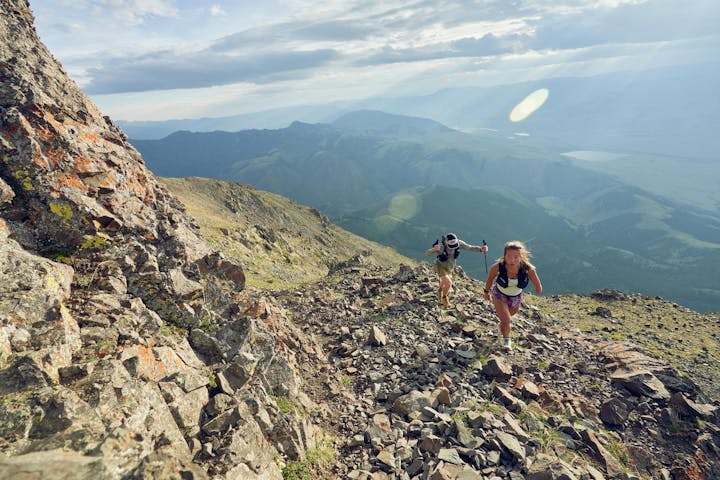 Hiking a rocky trail in the Oboz Katabatic Wind hiking shoes.