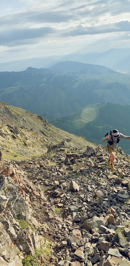 Hiking a rocky trail in the Oboz Katabatic Wind hiking shoes.