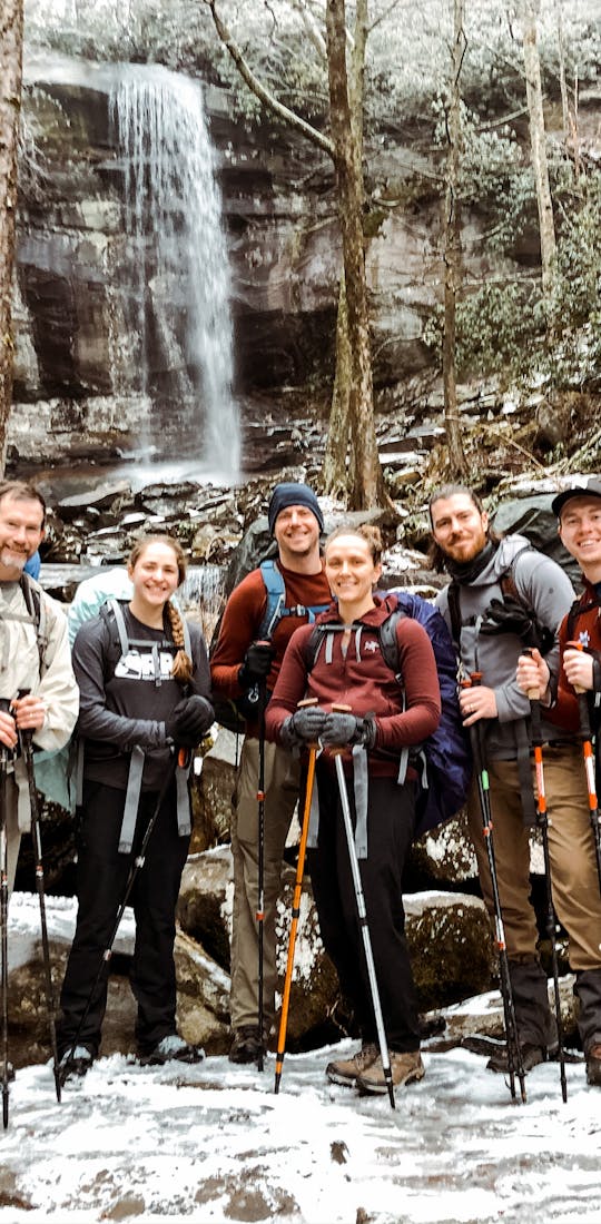 The RRT team on a hike in their Oboz hiking shoes