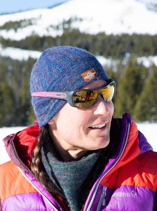 Oboz Local Hero, Hallie Zolynski, in the snowy Montana mountains.
