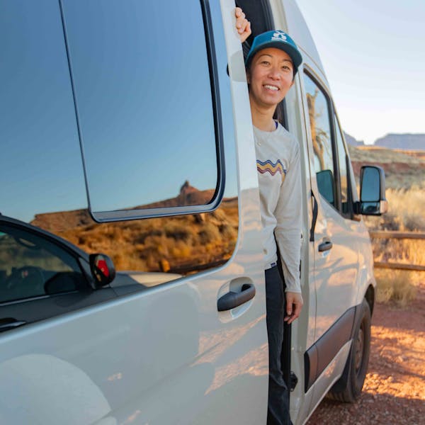 Woman wearing Oboz Whakata Ease while in a Van in Moab, Utah.