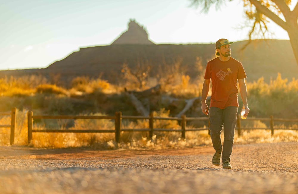 Oboz Whakata Ease casual sandal on foot in Moab, Utah.