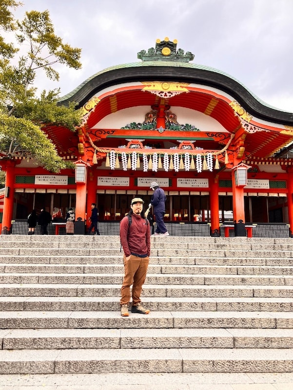 Tyler Lau on a trip abroad wearing Oboz hiking shoes. 