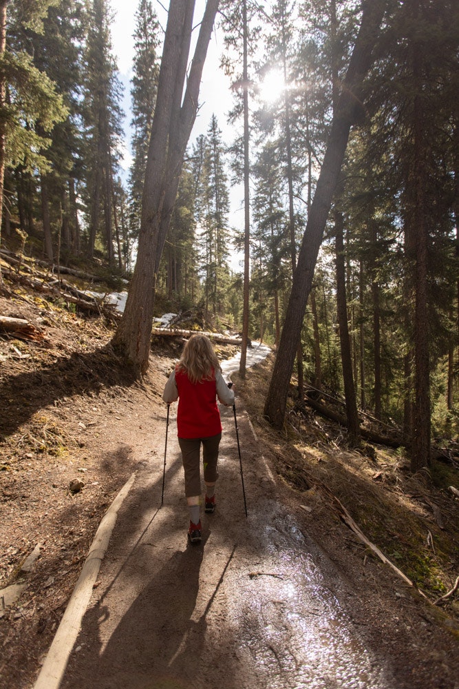 Oboz Local Hero Jo Giese on a hike at Ousel Falls, in Big Sky, Montana.