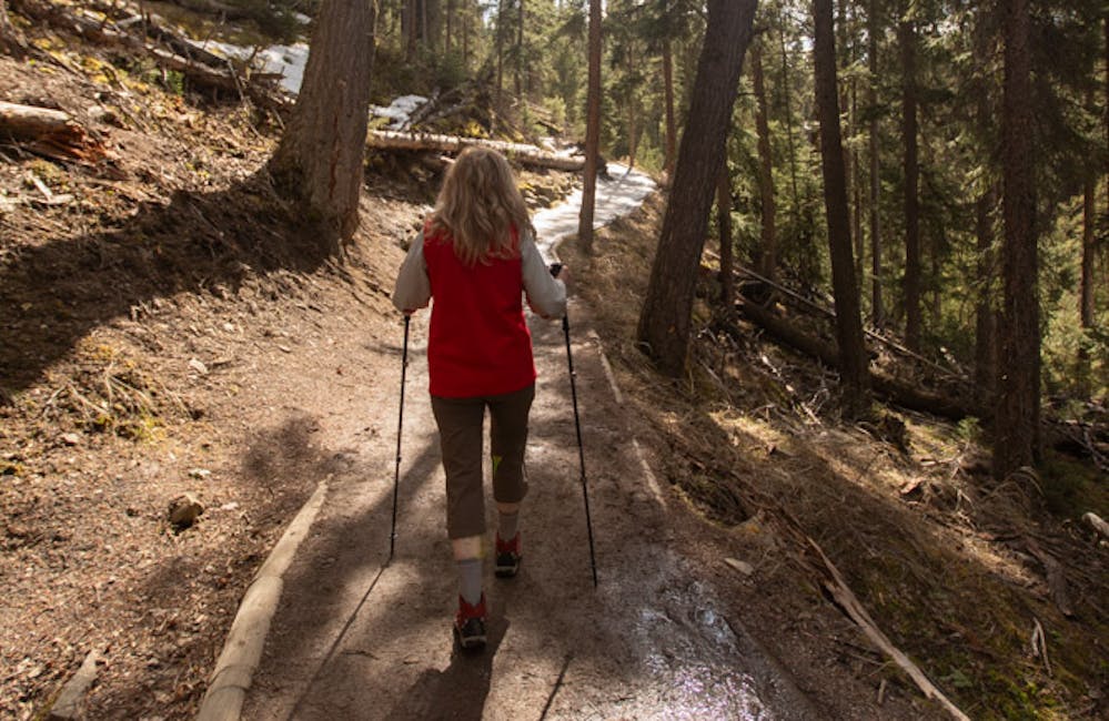 Oboz Local Hero Jo Giese on a hike at Ousel Falls, in Big Sky, Montana.