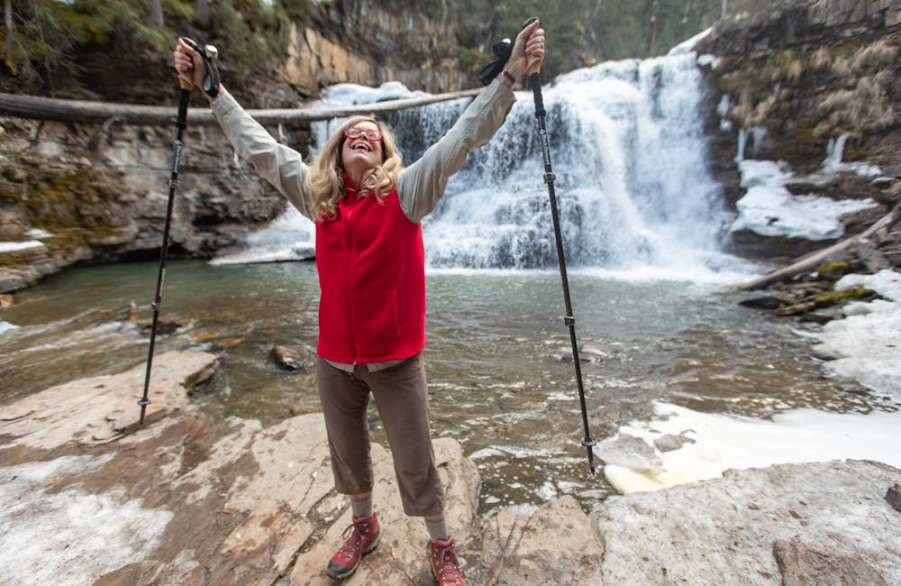 Oboz Local Hero Jo Giese on a hike at Ousel Falls, in Big Sky, Montana.