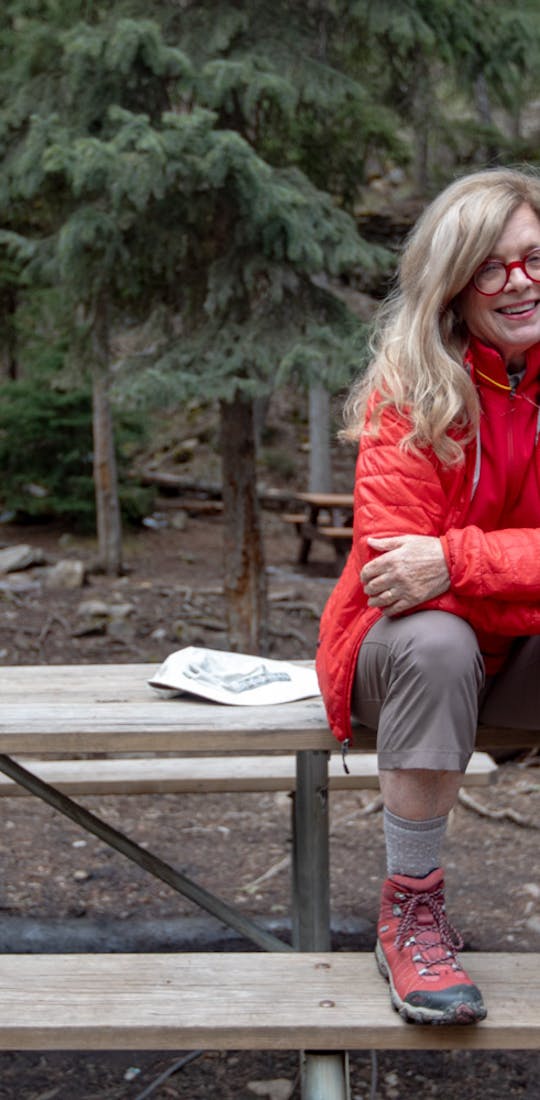Oboz Local Hero Jo Giese on a hike at Ousel Falls, in Big Sky, Montana.