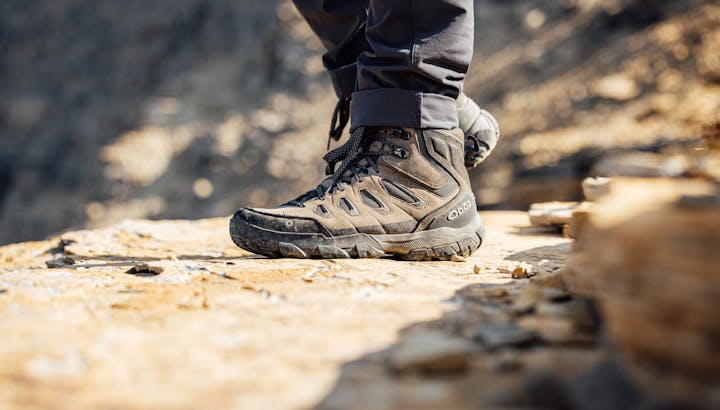 Sawtooth X Oboz hiking shoe on rocky trail.