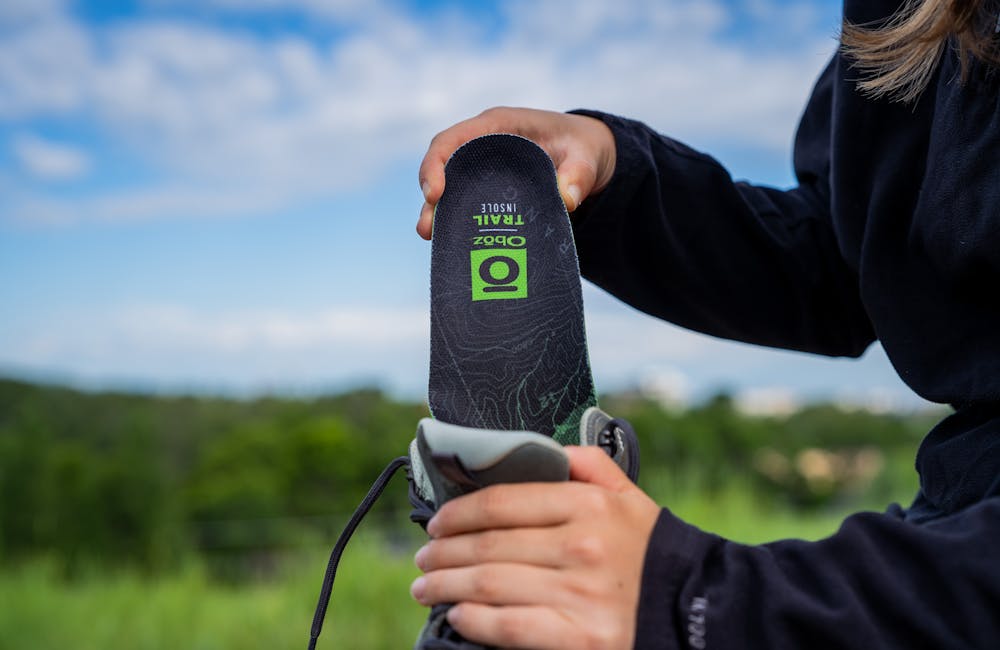 Putting the Oboz Trail insole in Oboz Sypes mid hiking shoe.