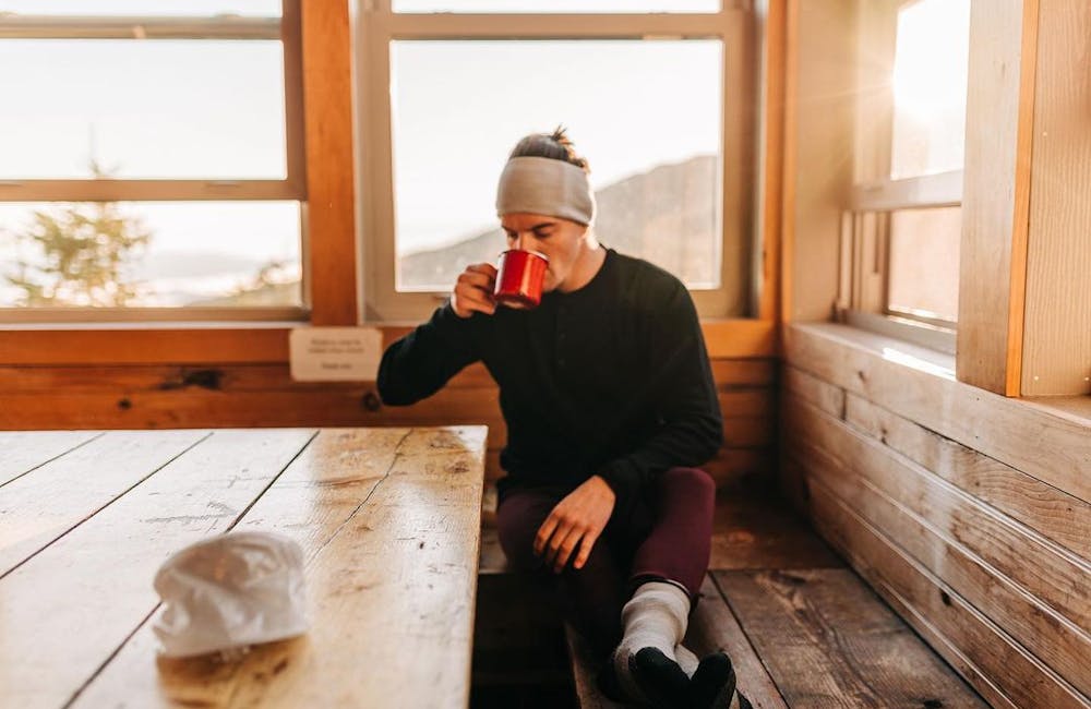 Oboz Local Hero, Riley McGurn camping in a fire watch tower.