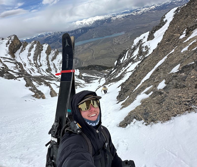 Oboz employee boot packing a ski run in the Montana backcountry.