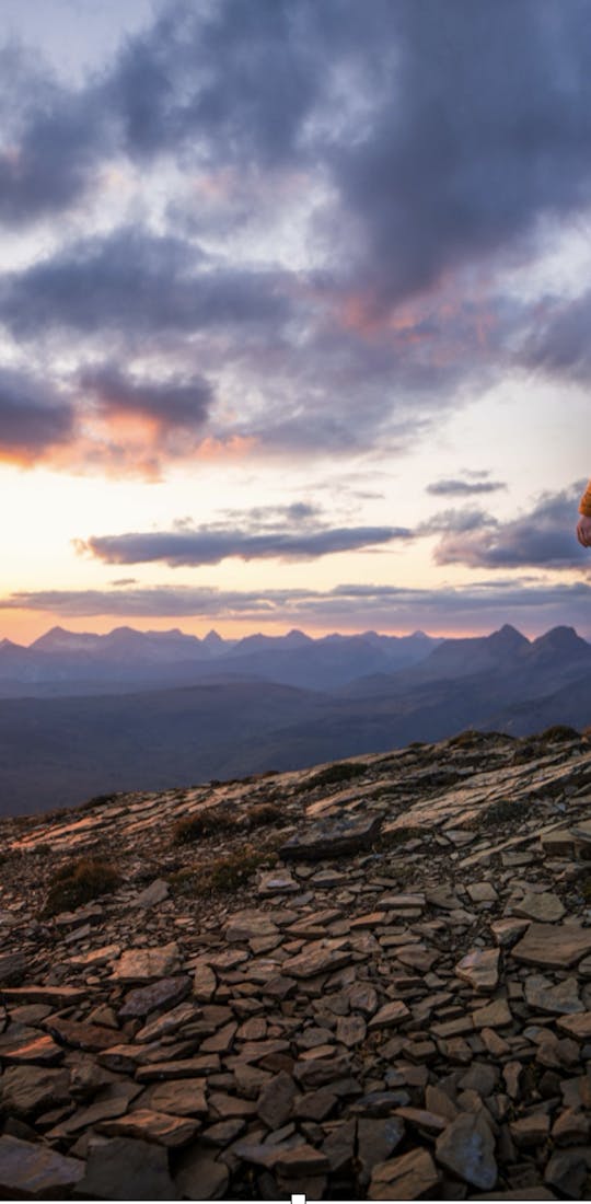 Jordan on a mountain ridge in Glacier National Park.
