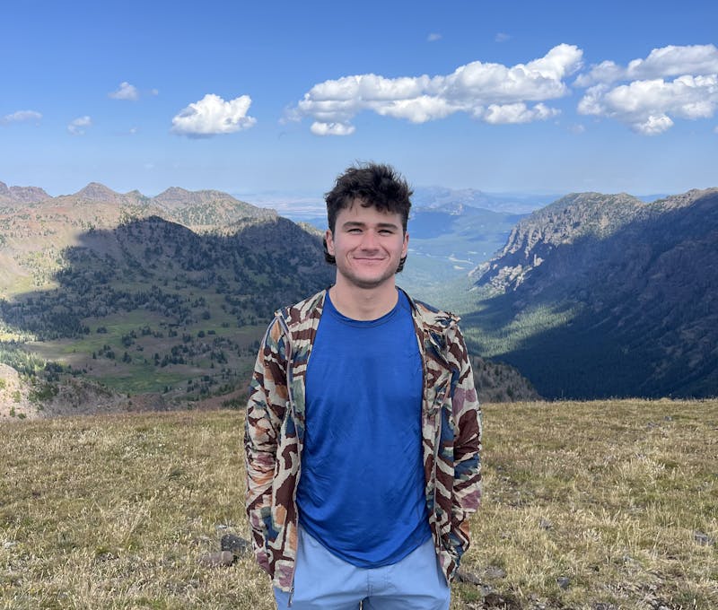 Oboz Footwear employee hiking Hyalite Peak in Gallatin County.