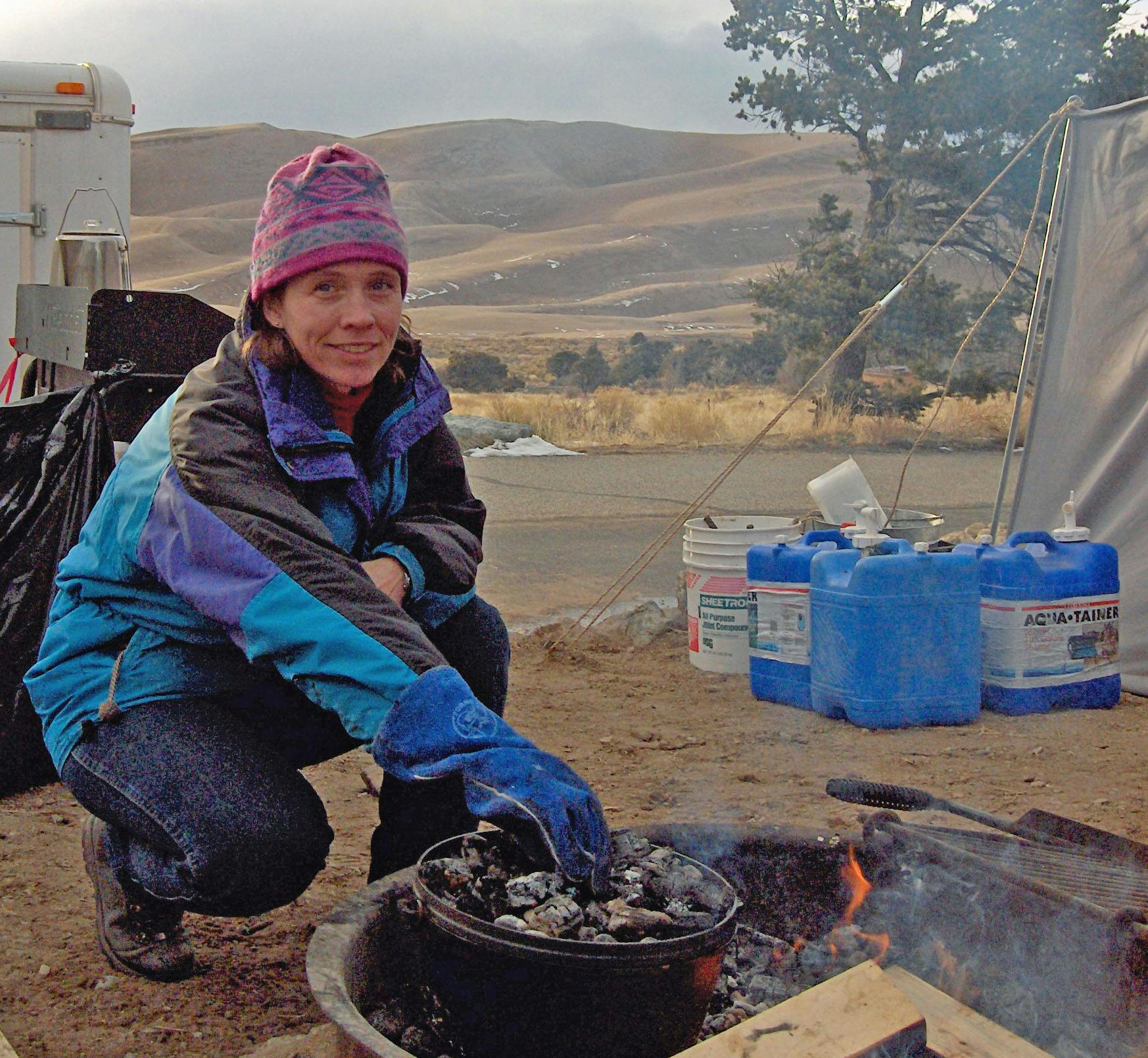 Oboz Local Hero Carol Kennedy cooking while at camp