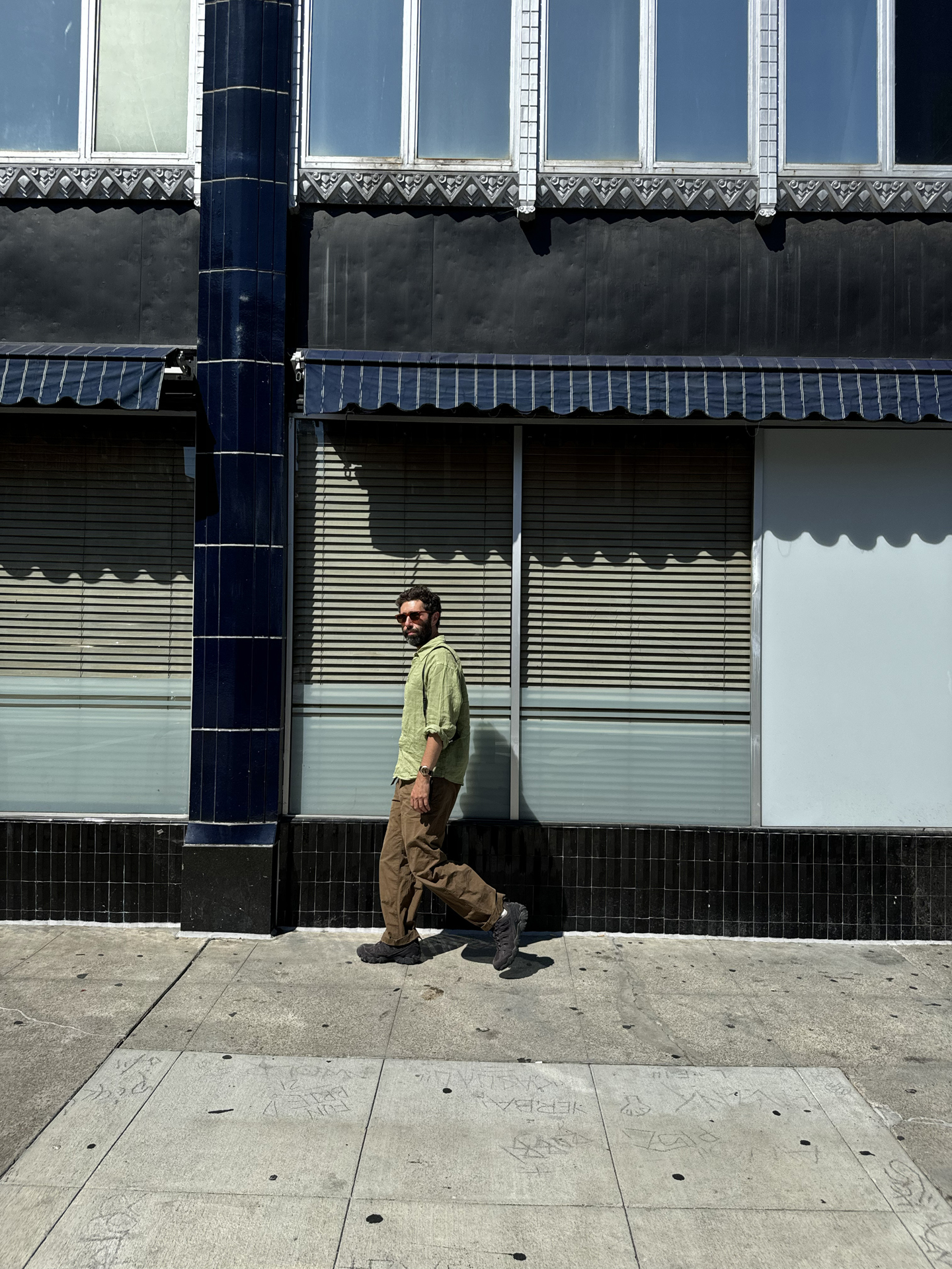 The Oboz x Blackbird Spyplane Swagtooth walking down the street.