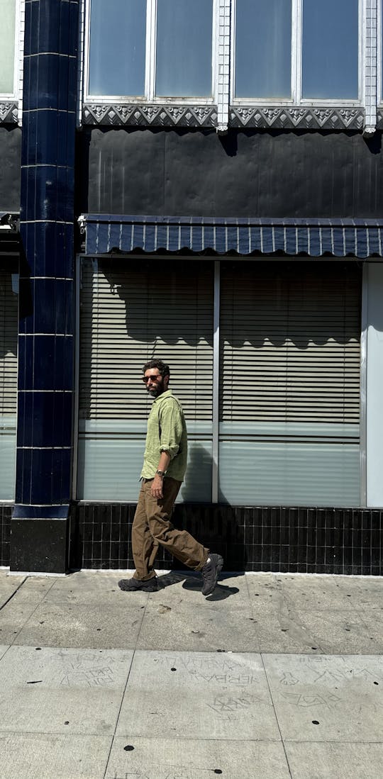 The Oboz x Blackbird Spyplane Swagtooth walking down the street.