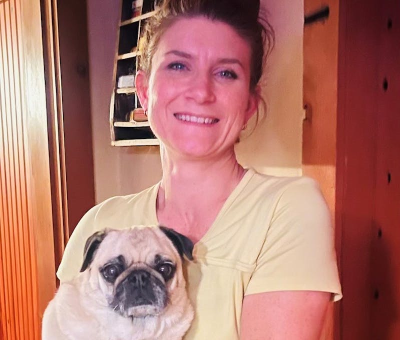 Oboz Footwear employee with her dog.
